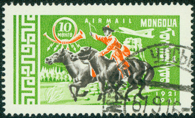 stamp printed in Mongolia, shows Mongolian rider on horse