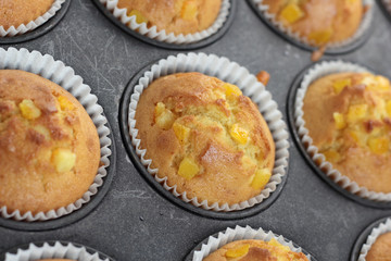 Muffins with orange zest just taken from the oven.