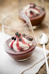 Chocolate pudding with whipped coconut cream