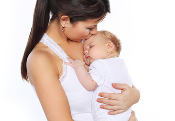 Sleeping baby on the hands mother