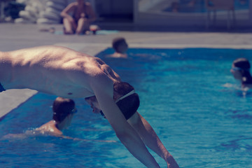 Simmer jumping into the pool.