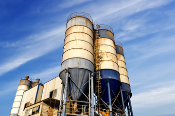 Concrete mixing tower. Concept of on-site construction facility.