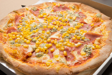 Pizza with cheese and corn