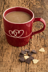 heart shaped chocolates and coffee in a mug