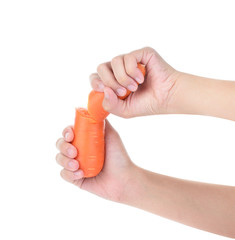 hand force carrot isolated on white background