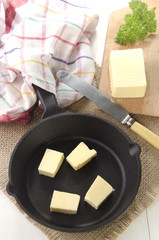 cold butter cubes in a pan