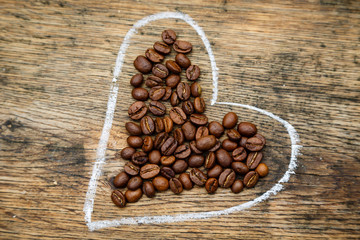 Heart sign filed with coffee beans