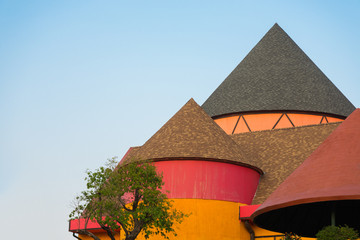 colorful cone shaped roof building