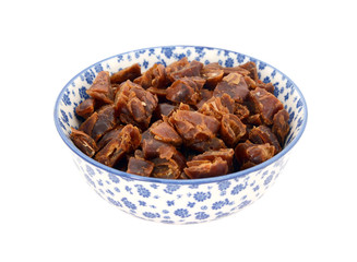 Chopped dates in a blue and white china bowl