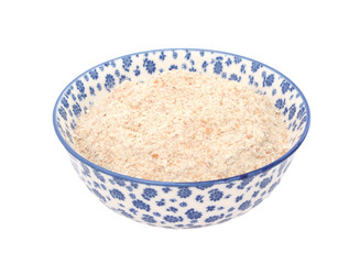 Wholemeal flour in a blue and white china bowl