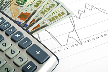 Business concept - calculator and money