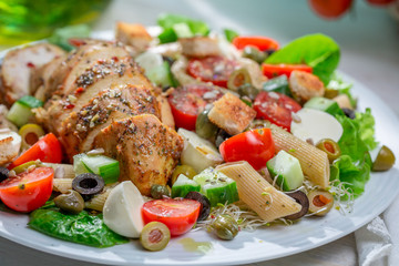 Closeup of homemade caesar salad with fresh vegetables