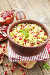 Couscous with pomegranate, raisins and spices