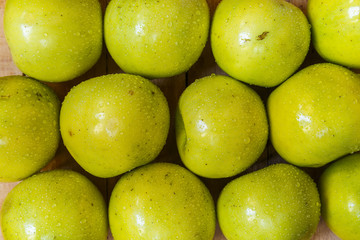 apples on wooden boards
