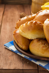 tasty pastry on plate at wood