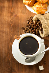 cup of coffee on wood