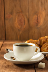 cup of coffee on wood