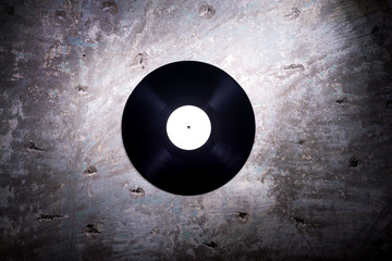 vinyl record on a concrete background