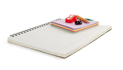 notebook and school supplies on white
