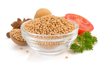 mustard spices spoon on white