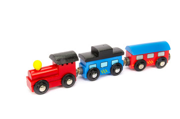 Wooden toy train with colorful blocs isolated