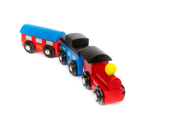 Naklejka premium Wooden toy train with colorful blocs isolated