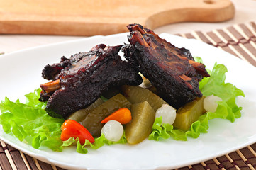 Baked beef ribs in honey soy marinade with pickled vegetables
