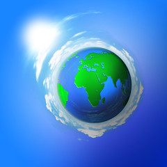 Naklejka premium Planet earth in the blue sky