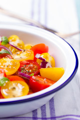 red and yellow cherry tomatoes salad