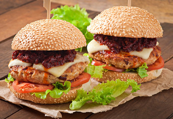 American burger with chicken and bacon, homemade barbecue sauce