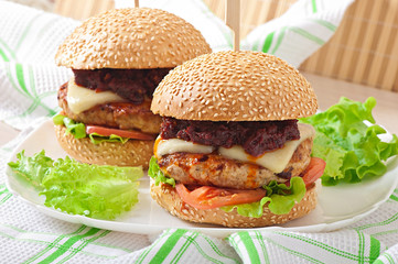 American burger with chicken and bacon, homemade barbecue sauce