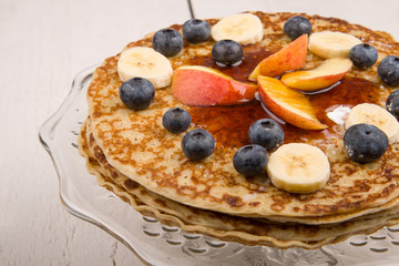 pancake with blueberries, apple and banana