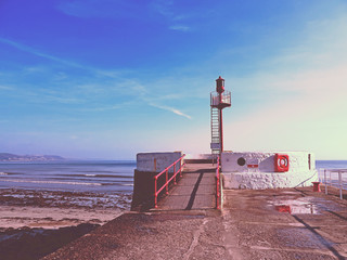 The Banjo pier, Looe, Cornwall - with shadows, filtered image