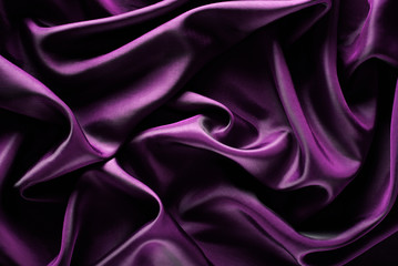 Abstract wave textile texture or background in violet color