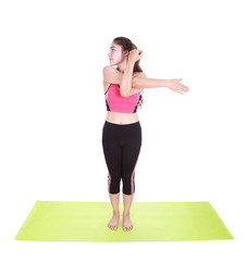 Young woman doing yoga exercise