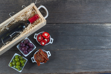 selection of spanish tapas with red wine from above