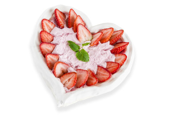 Meringue cake with strawberries isolated on white.