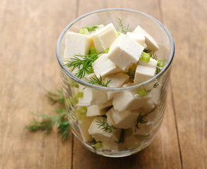 Feta cheese on table
