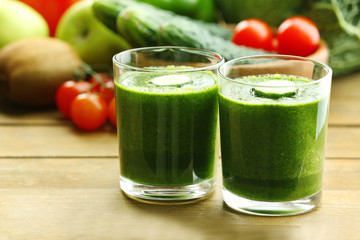 Green fresh healthy juice with fruits and vegetables