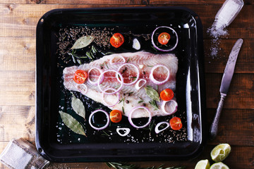 Pangasius fillet with spices and vegetables