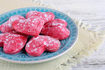 Cookies in form of heart in plate
