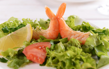 Tasty seafood on plate on table close-up