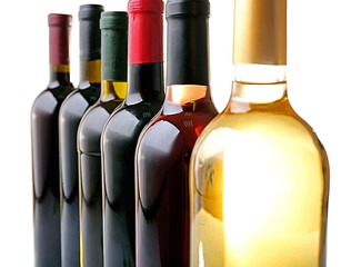Wine bottles in row close-up