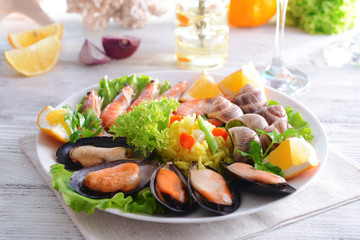 Seafood Paella on plate on table close-up