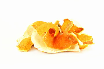 dried orange peels in white background