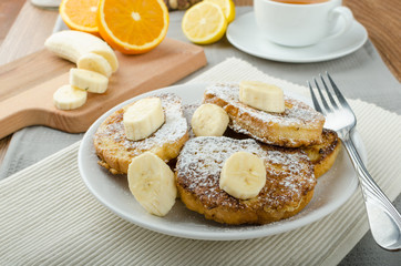 French toast to sweet, with banana sprinkled with sugar
