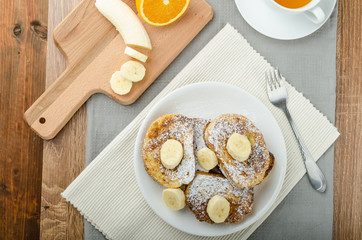 French toast to sweet, with banana sprinkled with sugar