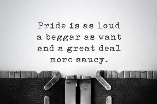 Pride. Inspirational quote typed on an old typewriter.
