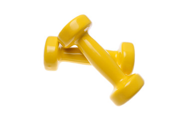 Pair of yellow dumbbells Isolated on white background