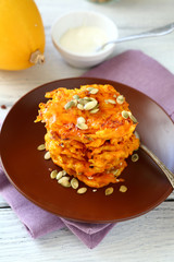 Pancakes with Pumpkin on wooden background